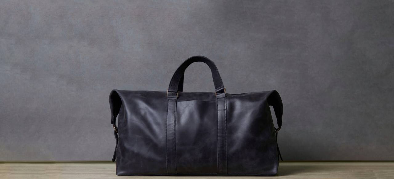 Дорожні сумки