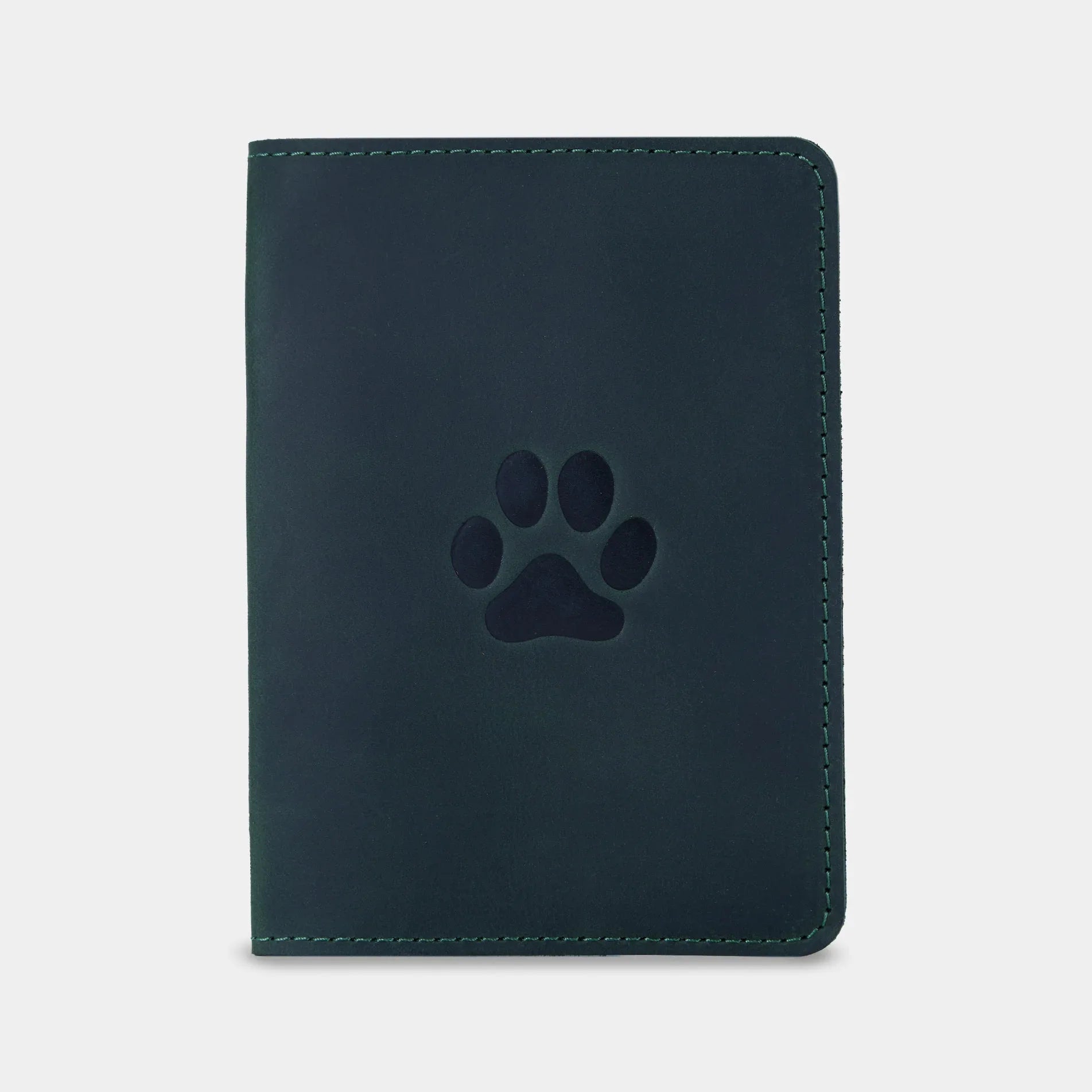 Зелена шкіряна обкладинка для ветеринарного паспорта Paw INCARNE з тисненням лапки на лицьовій стороні