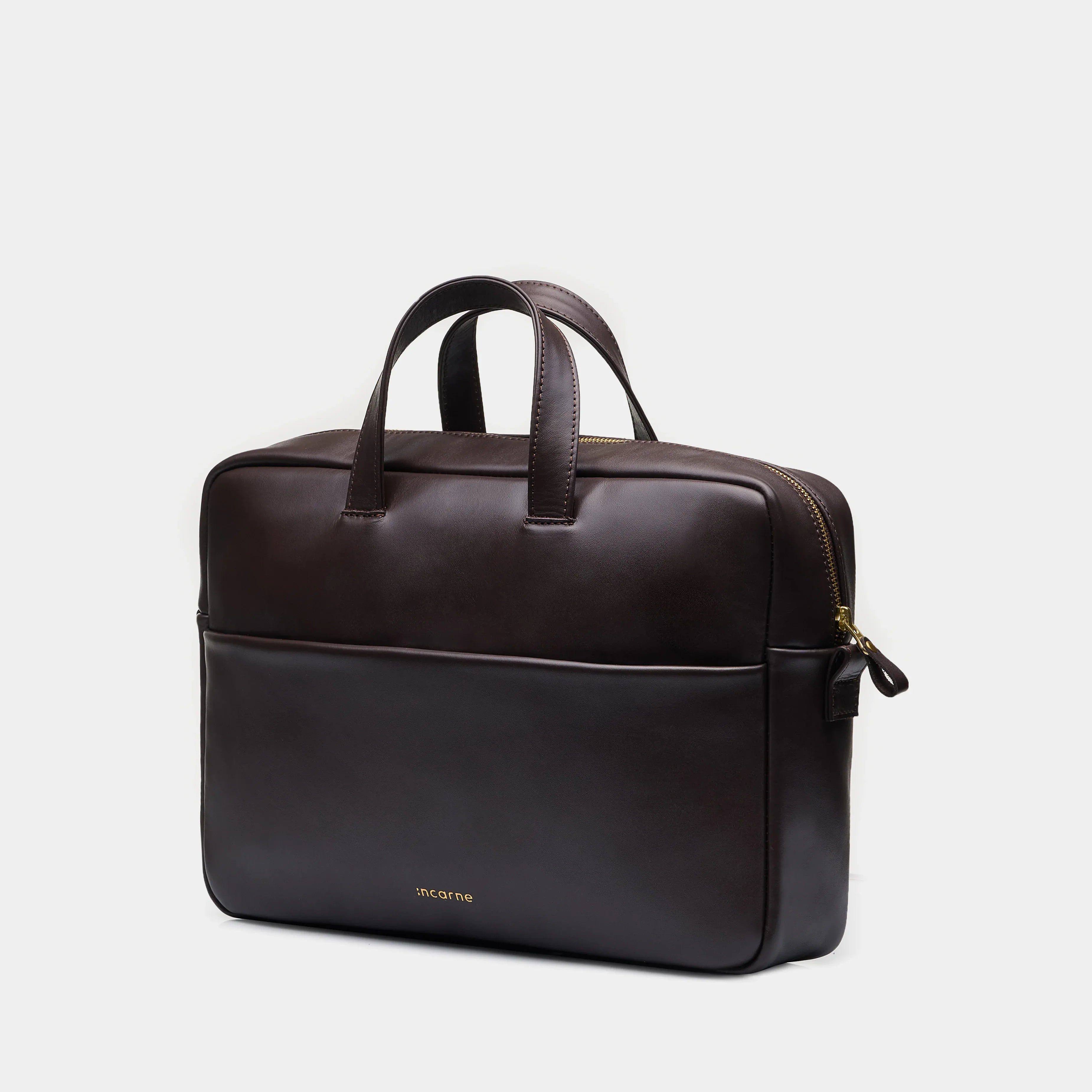 Деталь шкіряних ручок та металевої блискавки YKK на сумці для ноутбука Brief